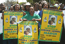 Women protest the death sentence by stoning passed by a Nigerian court on Amina Lawal