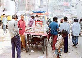 A view of roadside vendors behind the Clock Tower, Ludhiana, on Friday.