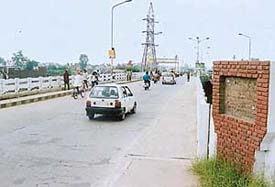 Space reserved for the foundation stone to be laid at the time of inauguration of the bridge on the Buddha nullah in Ludhiana on Friday. 
