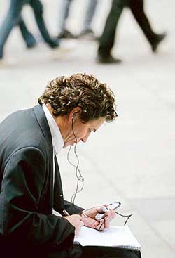 A businessman uses his mobile phone in central Sydney.