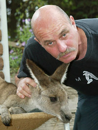 Australian farmer Len Richards with his pet kangaroo Lulu in Sydney 