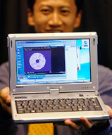 A Taiwan sales executive presents his company's latest product
