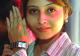 An Indian model displays new designs by Titan Industries