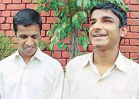 Visually impaired Mandeep Singh and Manglesh Kumar are all smiles as they talk of their expectations from the Presidents visit at the Institute of Blind, Sector 26, Chandigarh, on Tuesday.