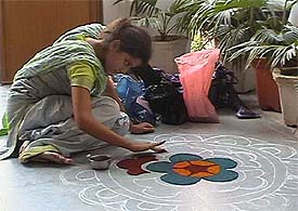 A participant of the rangoli competition at Koshish-2003