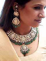 A model displays Kundan Meenakari at a Press conference in Bangalore