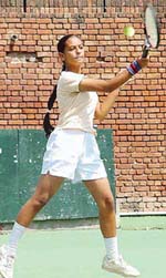 Jaswinder Kaur of Punjab in action during the AITA Talent Series Tournament being held at CLTA, Sector 10, Chandigarh, on Wednesday.