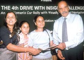 Monica and Madhu, blind navigators, receiving the Brail Map from Runu Bisht of the Empress Club and Gen. O.P.Malhotra, NAB, at a press conference 