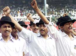 Schoolchildren sing a patriotic song on the occasion of the birth anniversary celebrations of Shaheed Bhagat Singh in New Delhi 