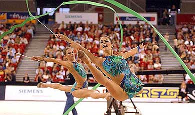 The Russian team performs the ribbon exercise during the team apparatus competition at the 26th Rhythmic Gymnastics World championships in Budapest