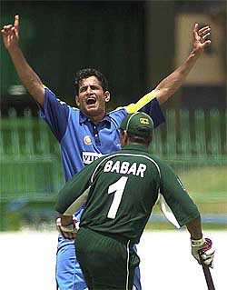 Irfan Pathan of Indian emerging cricket team celebrates after dismissing Pakistan emerging cricket teams Aasim Muneer Butt 