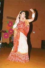 A dance performance in progress at a charity show 