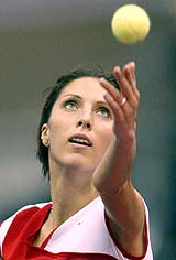 Russia's Anastasia Myskina serves to Eleni Daniilidou of Greece