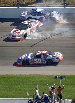 Brian Vickers gets tangled up with Jason Leffler