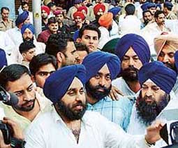 Sukhbir Badal comes out of the office of the Economic Offences Wing (EOW) after facing a questioning session in Chandigarh on Thursday
