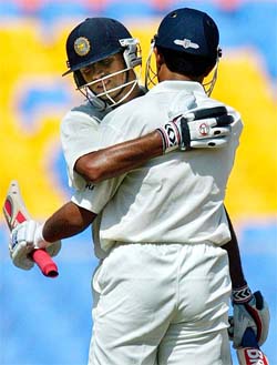 India's captain Sourav Ganguly congratulates teammate Rahul Dravid