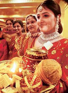 Member of Niharika Ladies Club wait for their turn to take part in a Karva queen contest in Ludhiana on Friday.