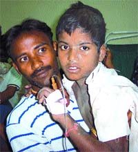 One of the children injured in a building collapse at Kalyanpuri in the Capital