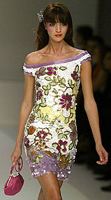 A model presents a creation by Italian designer Valentino at a Spring-Summer ready-to-wear women's collection in Paris 
