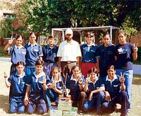 The winning team of SAI-18 with their coach after winning the title at Mandi