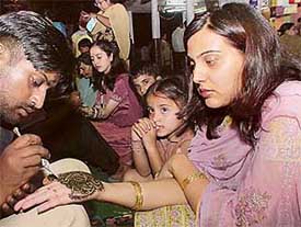 As the festival of Karva Chauth draws near, women get busy embellishing their hands with henna