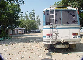 A damaged bus at Nanaksar Thath in Siahar village after Saturday nights violent incidents