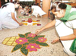 Girls take part in rangoli-making competition held at Goswami Ganesh Dutt Sanatan Dharam College, Sector 32, Chandigarh, on Monday.