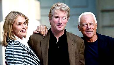 US actors Richard Gere and Lauren Hutton pose with Italian designer Giorgio Armani