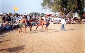 A kabaddi match in progress during the annual sports festival at Mudian Kalan