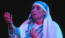 Italian actress Rosa Lembo sings during a performance of Mother Teresa, The Musical