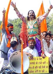 VHP activists converge on Delhis Ram Lila ground prior to leaving for Ayodhya 