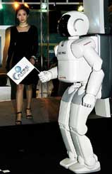 Humanoid robot Asimo welcomes guests to the APEC Investment Mart in Bangkok 