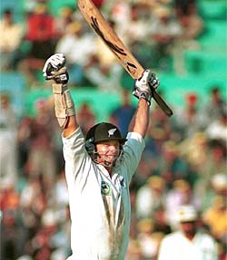 Mark Richardson celebrates his century against India 