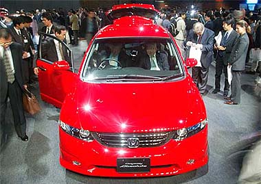 Honda Motor's new version of its popular Odyssey minivan is unveiled in Tokyo, Japan. The new Odyssey makes its debut on October 24 for $27,060.  Reuters
