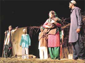 A scene from "Pinjar" that was staged at Tagore Theatre