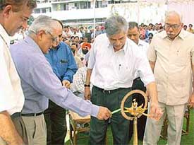 The Editor-in-Chief of The Tribune group of newspapers, Mr H.K. Dua, and the General Manager of The Tribune Trust, Mr R.N. Gupta, light the traditional lamp
