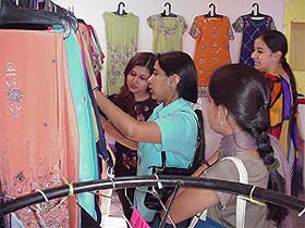Visitors have a look at designer apparel at an exhibition in Ludhiana