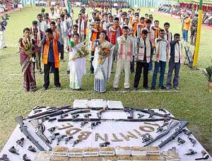 The United Liberation Front of Assam (ULFA) and National Democratic Front of Bodoland (NDFA) militants take oath to shun violence during a surrender ceremony at Tamulpur near Guwahati.