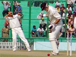 Sachin Tendulkar celebrates after bowling New Zealand captain Stephen Fleming on the second day of the second Test at PCA Stadium, Mohali, on Friday. New Zealand finished the day strongly on 536 for five.  Tribune photo by Manoj Mahajan