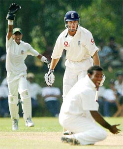 England captain Michael Vaughan loses his wicket for one run as Bangladesh bowler Alamgir Kabir celebrates during the tourists' match against the Bangladesh A side at the Bangladesh Institute of Sport in Dhaka.  AP/PTI