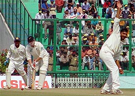 Harbhajan Singh unsuccessfully appeals for an lbw against Scott Styris of New Zealand on the second day of the second Test at Mohali.  A Tribune photograph