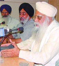 DSGMC president Prehlad Singh Chandok and Paramjit Singh Sarna addressing a press conference