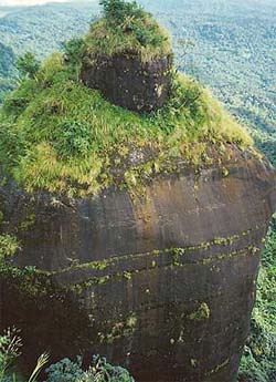 Khohramhah, a giant monolith at Cherrapunji, overlooks the plains of Bangladesh
