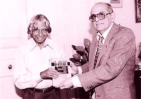 Mr Fali S. Nariman, President of the Bar Association of India, presents a copy of the report on international terrorism to the President of India