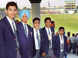 YPS Mohali students as ushers at the terrace pavilion of the PCA Stadium, SAS Nagar, on Sunday.