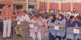 Teams from different schools take part in quiz competition organised by the District Education Department in Government Model Senior Secondary School