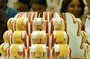Gold jewellery is displayed at a jewellery shop in New Delhi