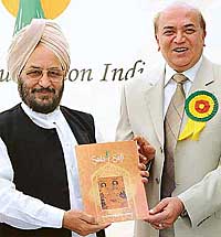 Punjab Finance Minister Lal Singh and Punjab DGP A.A. Siddiqui release a brochure on the occasion of the formal launch of the Sufi Foundation of India in Sector 10, Chandigarh, on Wednesday. 