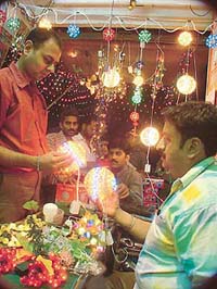 These colourfully lighted grapes and globes have flooded the market for the forthcoming Divali.