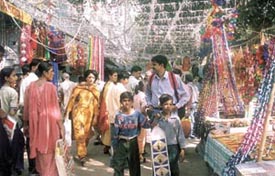 Shoppers Stop: Shoppers throng the Sarojini Nagar market for Divali gifts on Friday.